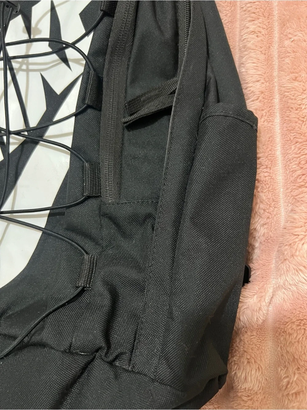 Nike Black Backpack with Large White Swoosh and Front Bungee